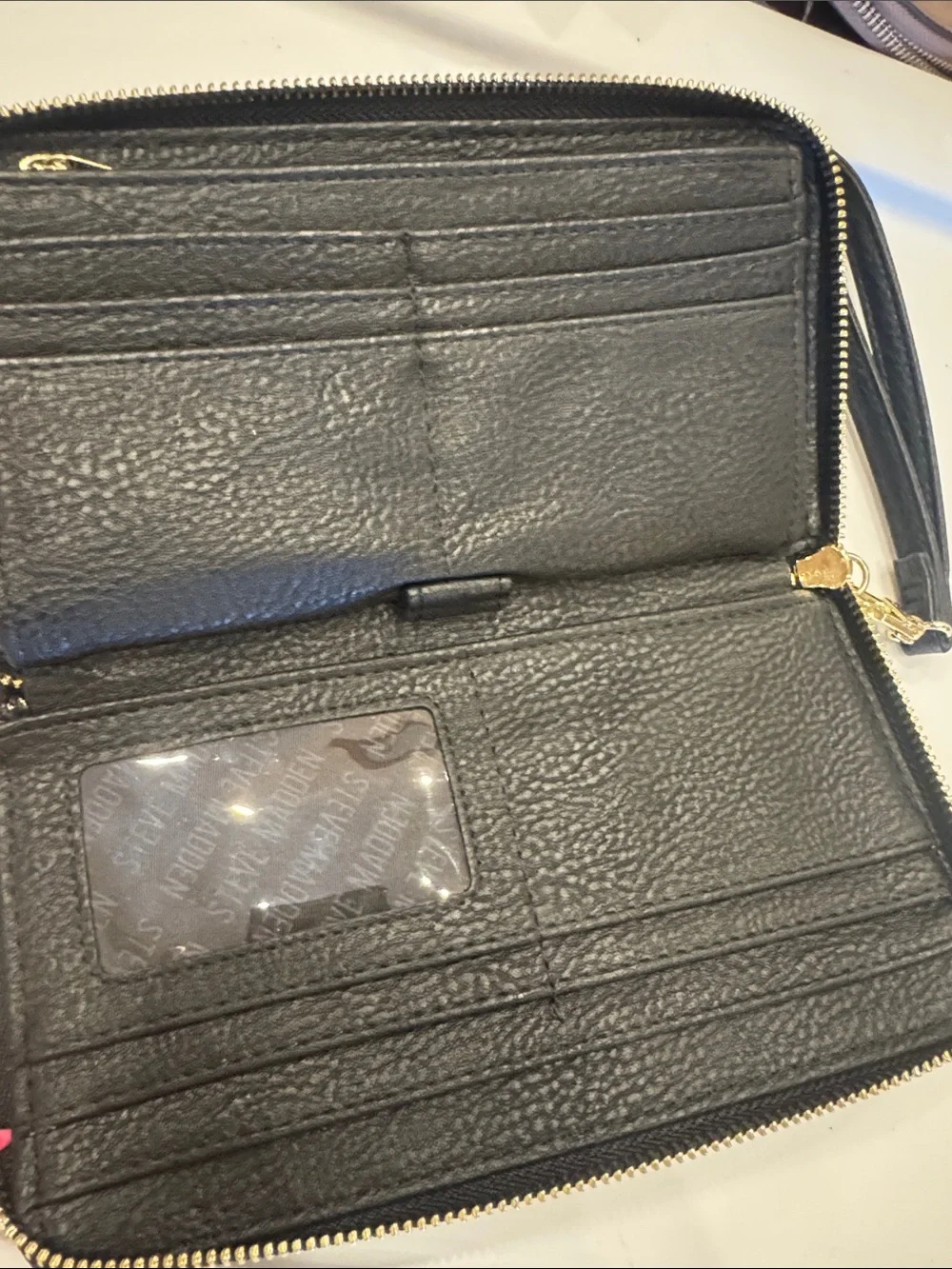Steve Madden Black Embossed Wristlet with Gold Accent